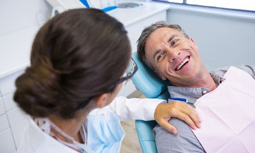 a man receiving urgent dental care