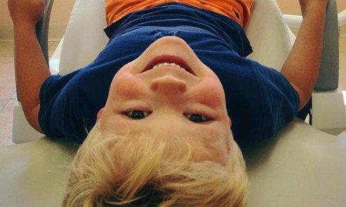 Smiling child in dental chair