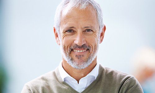 Senior man with healthy attractive smile